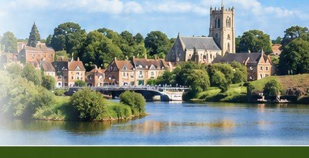 Town and riverside scene in England